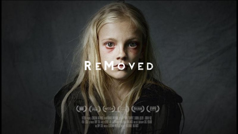 movie poster of Removed featuring a a small blonde girl who looks desheveled and stressed